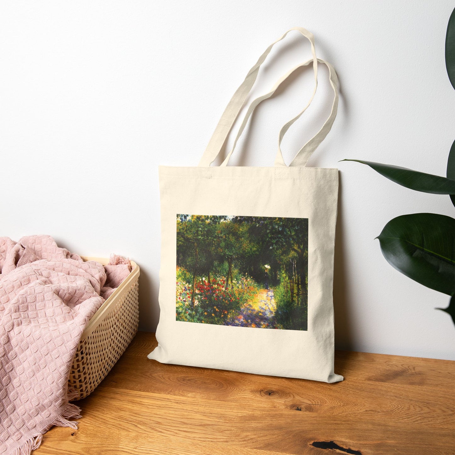 Woman in the Garden by Pierre-Auguste Renoir (Tote)